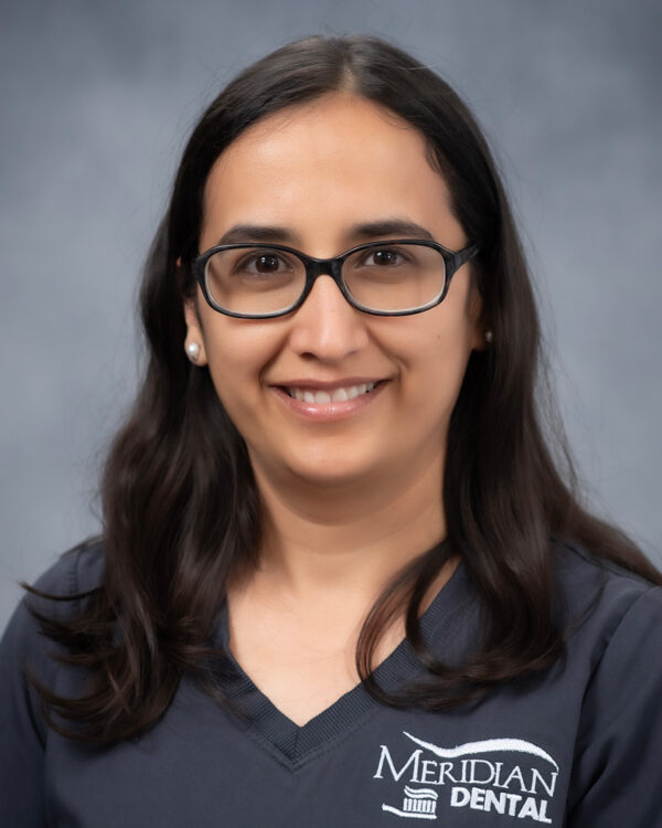 Headshot of Minu Dhungana